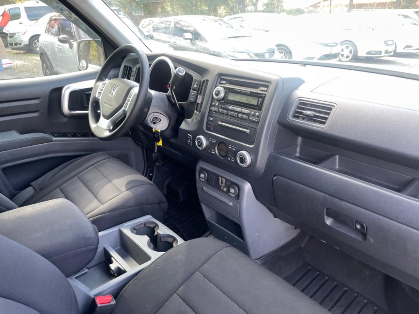 2007 SILVER HONDA RIDGELINE RTS (2HJYK16467H) with an 3.5L engine, Automatic transmission, located at 5103 Dorchester Rd., Charleston, SC, 29418-5607, (843) 767-1122, 36.245171, -115.228050 - Clean & Spacious Interior with 6-Disc CD/AUX/Sat, Dual Climate Control, Power Everything (windows, locks, seats, mirrors), All-weather Mats, Keyless Entry, Tow Package, Alloy Wheels. Clean CarFax (no accidents reported!) Local Trade-in!! 146k miles Located at New Life Auto Sales! 2023 WINNER for Po - Photo#8